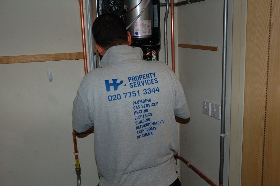 Gas Safe engineer from H2 Property Services on new boiler installation